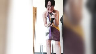 Milf Julie with anal dildo at window